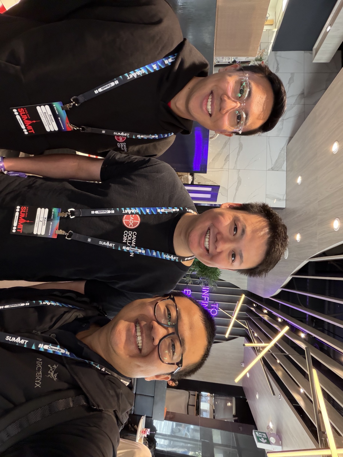 Kevin Zhang of Loon with a Loon team member and Dr. Steve Drew at Solana Summit Canada 2026